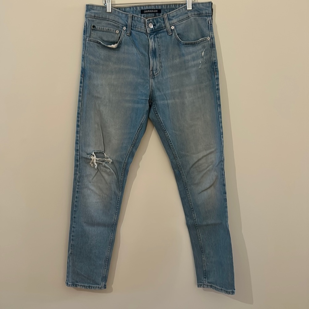 Calvin Klein light blue distressed skinny jeans